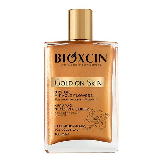 روغن مرطوب کننده و شاین صورت و بدن و مو بیوکسین Bioxin مدل Gold On Skin حجم 100 میل